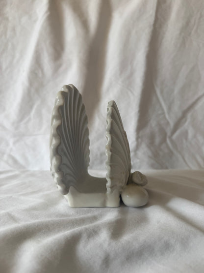 Side view of shell letter holder showing opening