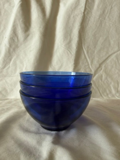 Stack of three cobalt blue glass bowls
