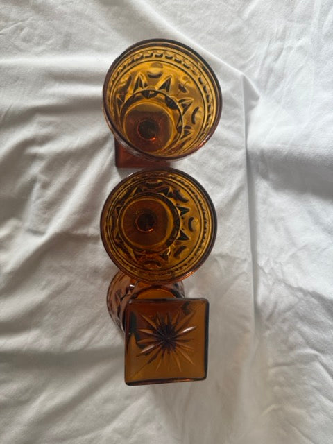 Amber goblets showing starburst square base