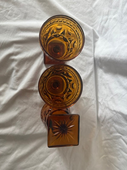 Amber goblets showing starburst square base