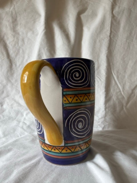 Italian Swirl pitcher showing yellow handle