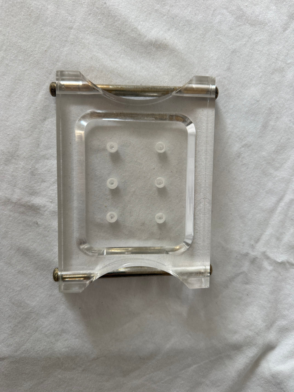 Lucite soap dish with brass rods