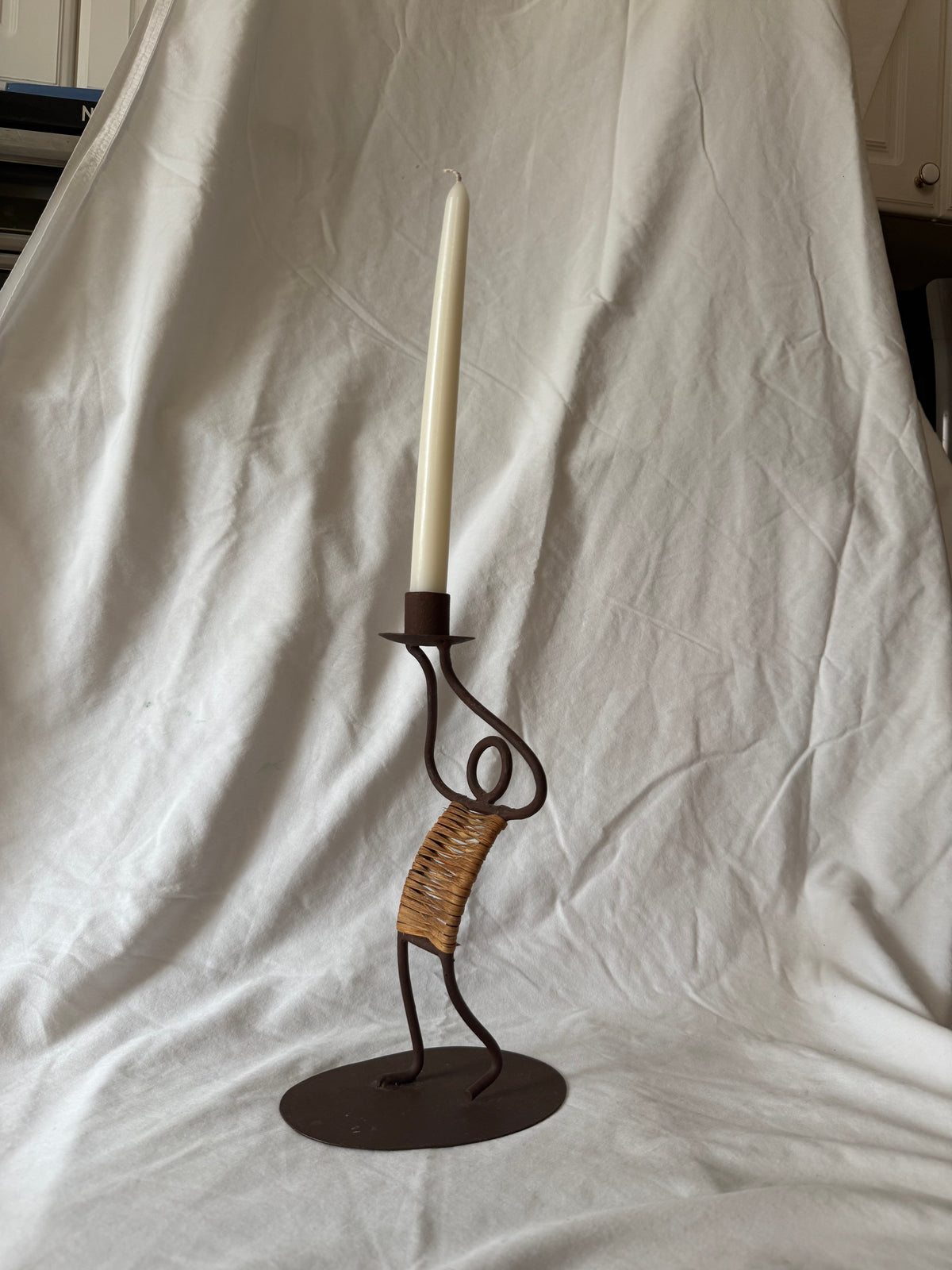 Iron and rattan figure candlestick, view 2